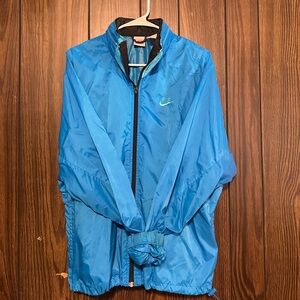 Vintage Nike Men’s Size L Blue Windbreaker Rain Jacket Stow-Able Hood